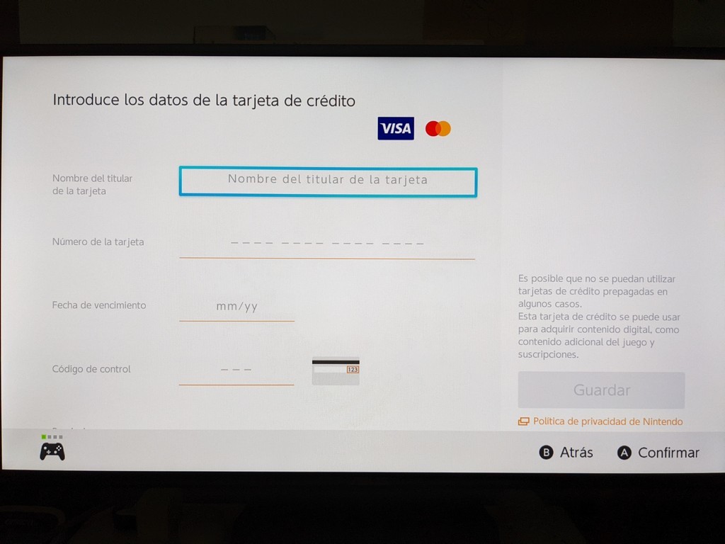 照片中提到了Introduce los datos de la tarjeta de crédito、VISA、Nombre del titular，包含了軟件、電腦、電腦顯示器、多媒體、屏幕截圖